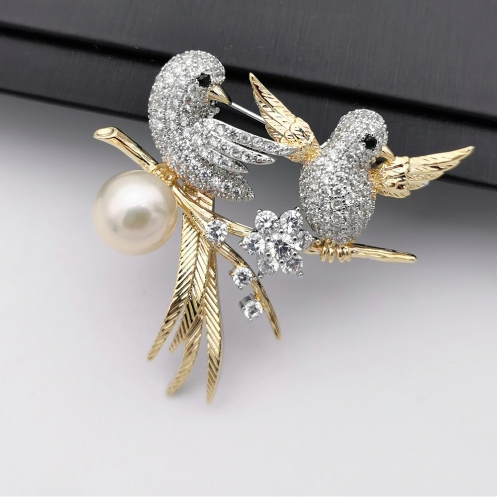 Elegant Gold and Silver Bird Brooch with Pearl
